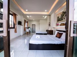 OYO 75377 Check In House, hotel de 3 estrellas en Surat Thani