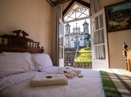 Teatro Hotel Boutique，位于欧鲁普雷图的酒店