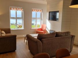 Inch Beach Cottages, holiday home in Inch