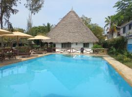 The New Muna House - 2 bedroom ensuite house., holiday home in Diani Beach