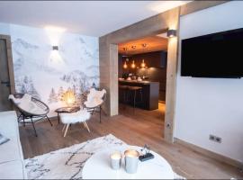 Luxueux appartement skis aux pieds, jacuzzi privatif, hotel v destinaci Courchevel