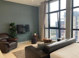 Urban Awe Apartment- iTowers 18th Floor, hótel í Gaborone