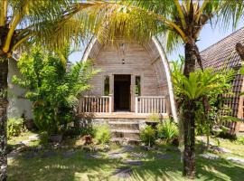 ํ๋ฃจ์นธ์ ์์นํ ํธํ
Ayumar Homestay Medewi