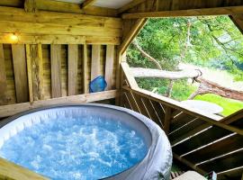 The Potting Shed near Tenby, Hot Tub access, 100" Projector, Four poster bed, Breakfast, holiday rental in Tenby