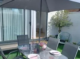 Modern 2BR House with Garden and Air Con Near Beach