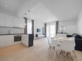 Modern Two Bedroom Apartment with Partial Sea View, Pool and Parking