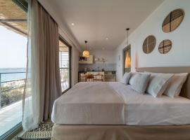 Thea Beachfront Suites in Lourdas beach, hôtel à Lourdhata