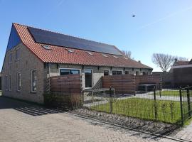 Paardenstal, appartement in Hollum