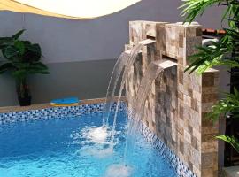Private pool Cassa Dinies, Wifi , Bbq,10 pax, hotel with parking in Rantau Panjang