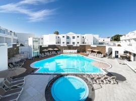 Aqua Suites, hotell i Puerto del Carmen