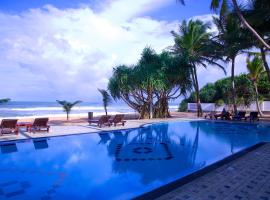 Whispering Palms Hotel, boutique hotel in Bentota