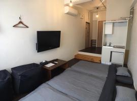 ゴールデンマイルホステル３Ｆ完全個室Aタイプ, hostel din Amami