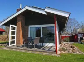 Einladendes Blockhaus mit 2 Terrassen und gemütlichem Kaminofen nahe des Ostseestrandes in Damp