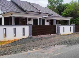 afza Homestay Paka B, holiday home in Paka