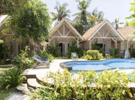 Coconut Village Guest House Lembongan RedPartner, hotel di Nusa Lembongan