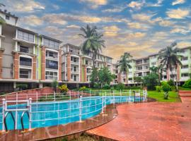 Amazing Pool View Candolim Goa 2BHK Apartment, hotel in Candolim