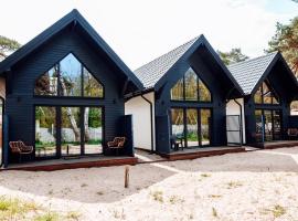 Domki na wydmie, cabana o cottage a Dziwnówek