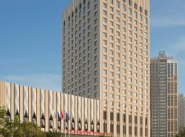 Wanda Realm Chifeng Hotel, hotel con estacionamiento en Chifeng