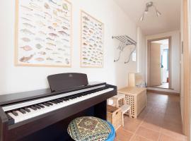 Play Piano with seaview, apartment in Cala Gonone