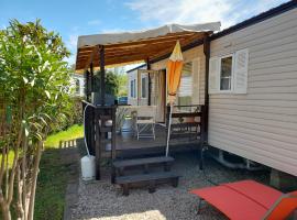 Mobil home - Clim, LL, TV - Camping Le Lac des Rêves '4 étoiles' - 001, campsite in Lattes
