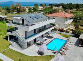 V luxury Suites, guest house in Pefkohori