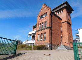 Seelotsenstation Sassnitz mit Hafenblick by Unsere Urlaubszeit，薩斯尼茨的家庭式飯店