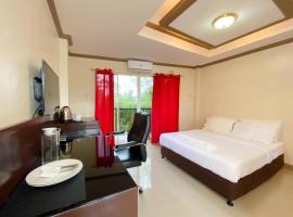 Red Palm Inn balcony room with Netflix, hotel com estacionamento em Baybay