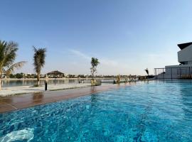 Relaxing villa with access to pool and beach, hotel en Ras al-Jaima