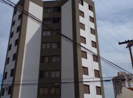 Apartamento Aconchegante com Estacionamento, apartment in Uberlândia