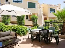 Beautiful Townhouse with views over the communal pool close to Campoamor Golf Course