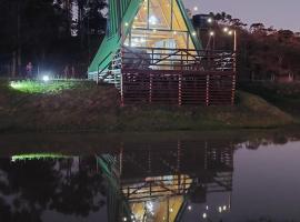 Chalé super aconchegante a beira do lago., sewaan penginapan di Rio Rufino