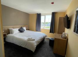 Tinapa Suites, hotel a Manchester
