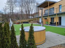Apartmány DOMA Domaša, hotel with hot tubs in Holčíkovce