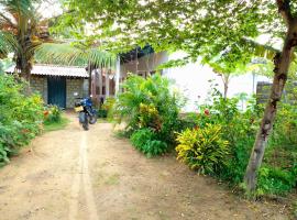 U new guest house, casa de hóspedes em Nilaveli