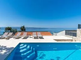 New! Villa Atopos with heated private pool, 5 bedrooms, Cinema room, panoramic sea views
