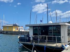 Hausboot Ferienhaus Captains Boat, Hotel in Kappeln