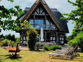 Landhaus am Achterwasser mit Bootssteg, hotell sihtkohas Grüssow