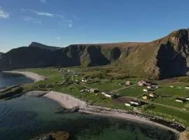 Sjarmerende hus med orkesterplass til hav og fjell