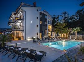Luxury Apartment Nina with heated swimming pool, Villa Adriatic, family hotel in Ičići