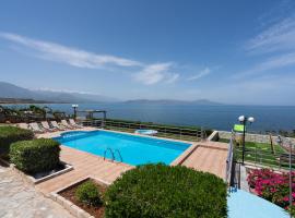 Beachfront Family Villa Katerina with Private pool, Playground, BBQ & Amazing Sea Views!, hotel i Petres