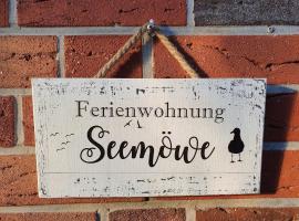 Ferienwohnung Seemöwe, alojamento para férias em Krummhörn