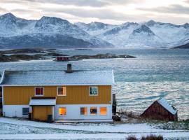 Cozy apartment by the sea, rental pantai di Tromso