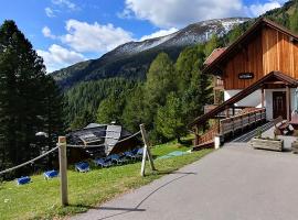 Bergheim Schmidt Ski-In Ski-Out Appartements Almhütten im Wald โรงแรมในทูร์ราคาฮัว