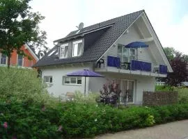 44 EG - Ferienwohnung mit Terrasse und Seeblick