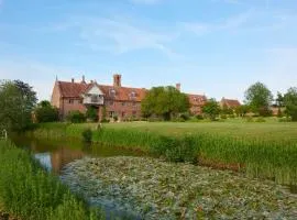 A Luxury Tudor Hall & Gardens Located on Breath-Taking Norfolk Estate