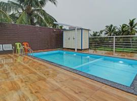 Itsy By Treebo - La Prince Residency, hotel con piscina a Morjim