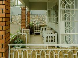 City Oasis by Siima _ Hidden Gem City family home, hotel in Kampala