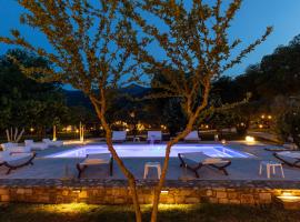 Natura Bungalows, hotel cerca de Iglesia Agios Ioannis, Limenas