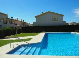 Casa en l'Estartit, piscina, jardín comunitario