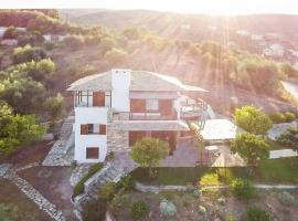 Seaside House with view over Pagasitikos, готель у місті Афісос